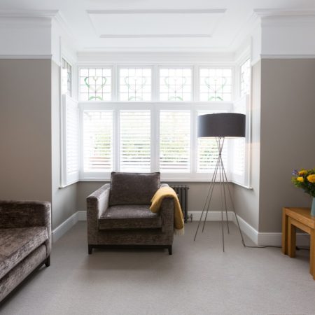 interior of living room with white bay casement windows