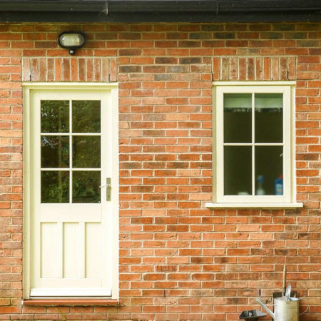 traditional timber back door with glazing
