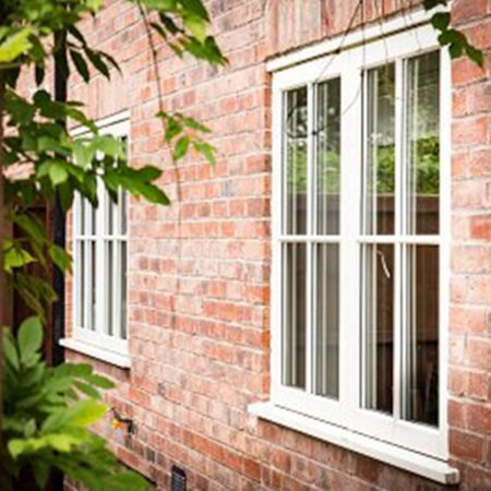 wooden casement windows with astragal bar design
