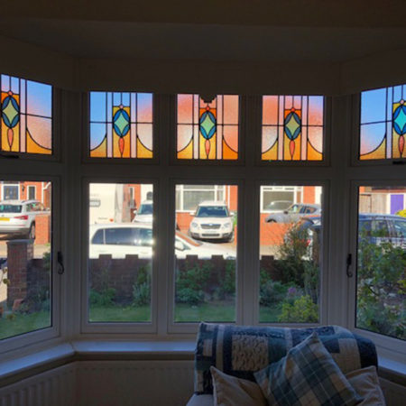 replacement timber casement windows with stained glass