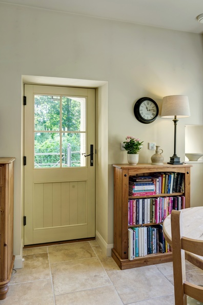 cream back door with glass panel and glazing bars with black handle