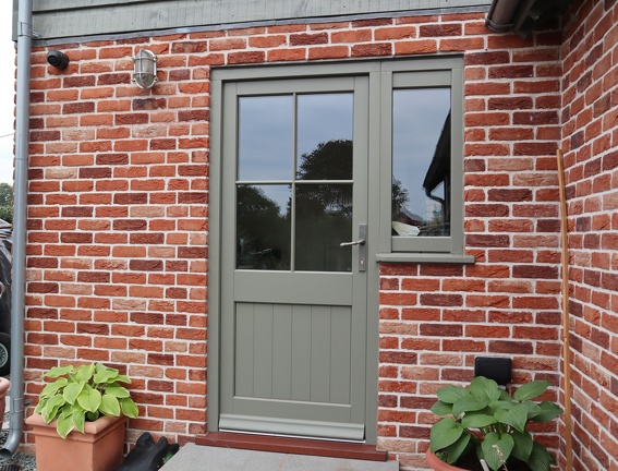 closed Moss Grey side door with window
