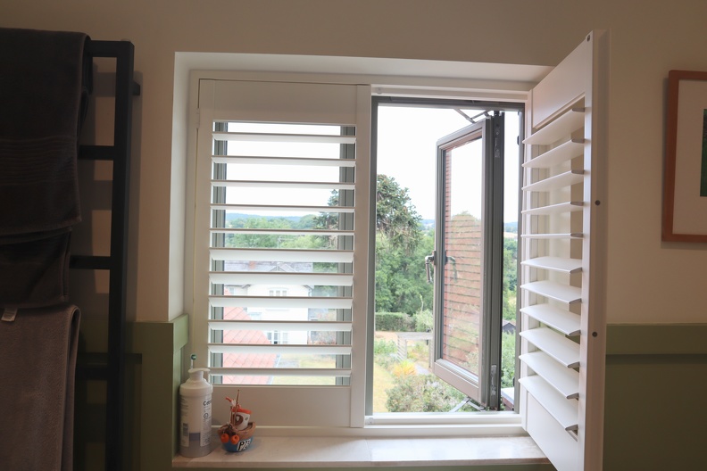 casement window with shutters