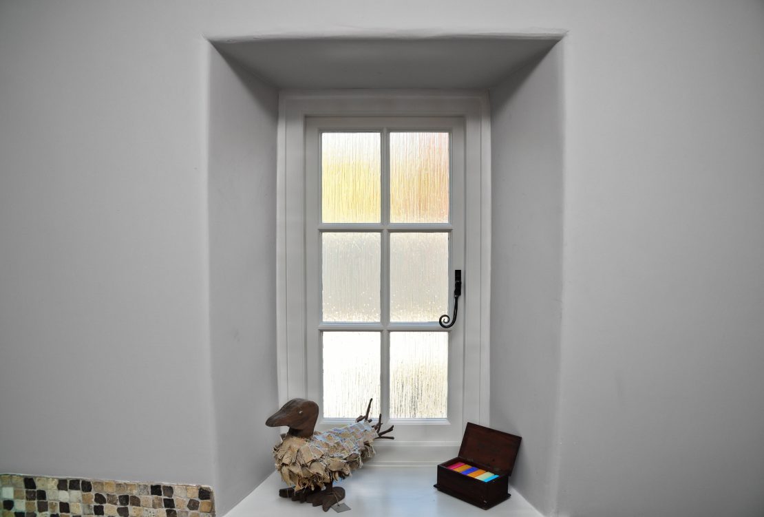 timber casement window painted in cream