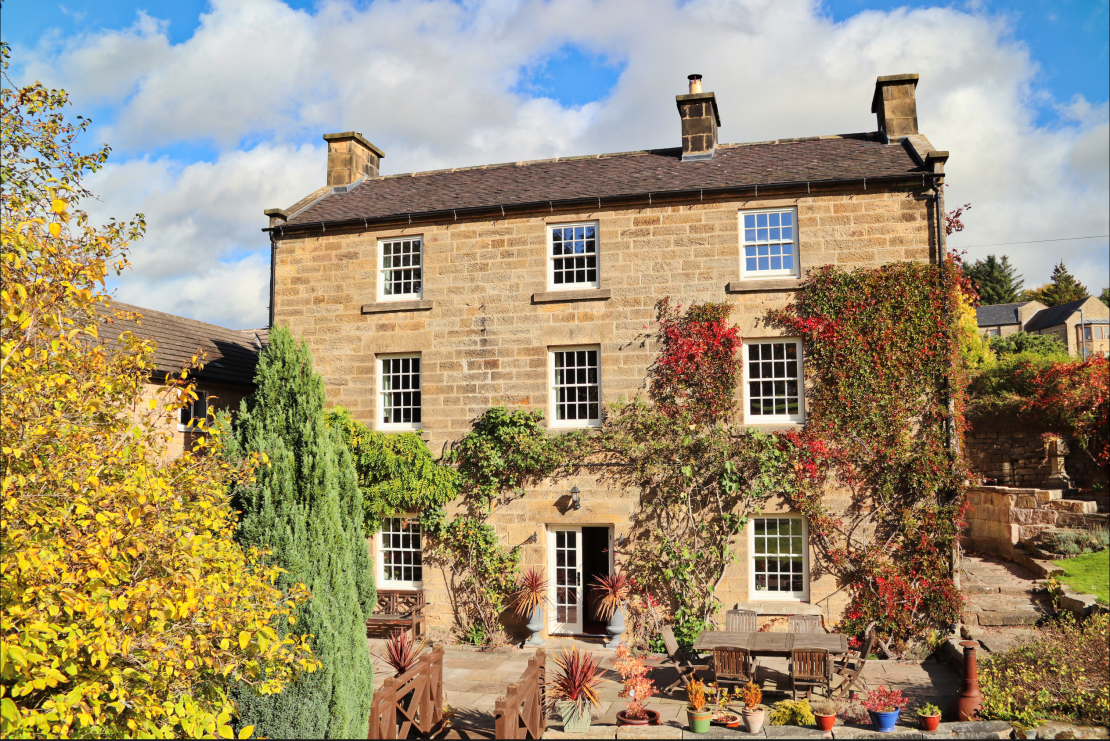 External of Georgian building showing timber sash windows, a choice that is better for the environment