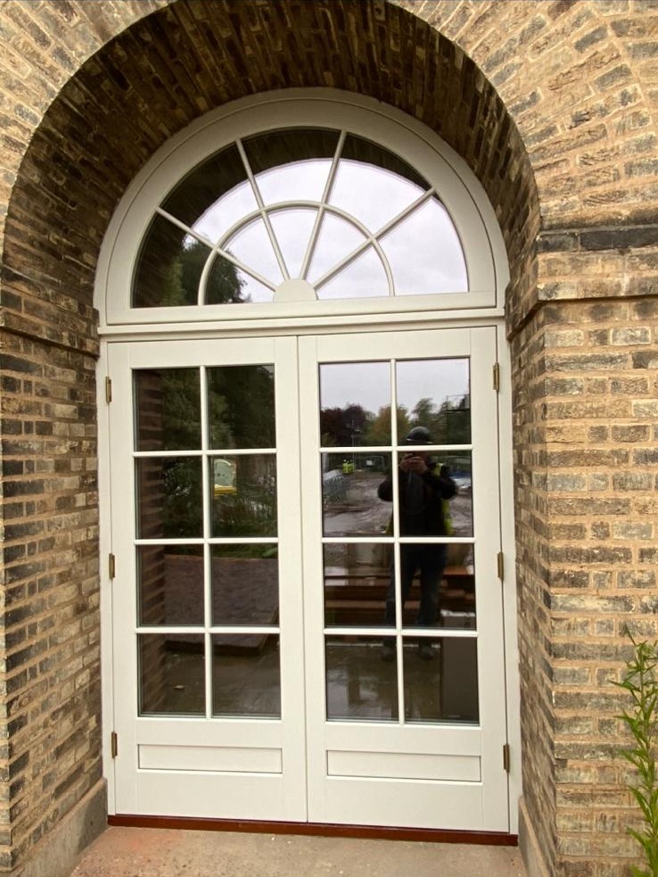 arched top french doors with astragal bars