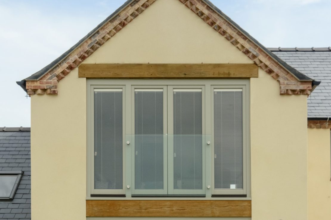 Juliet balcony with tilt and sliding doors