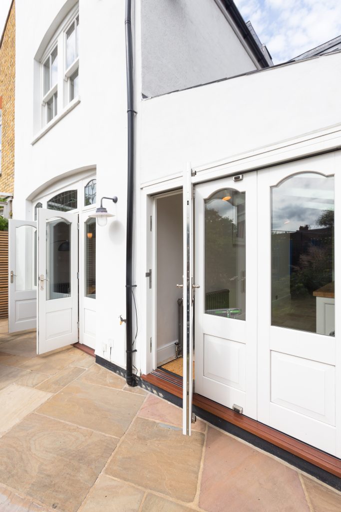 part panelled timber bifolds in a period property