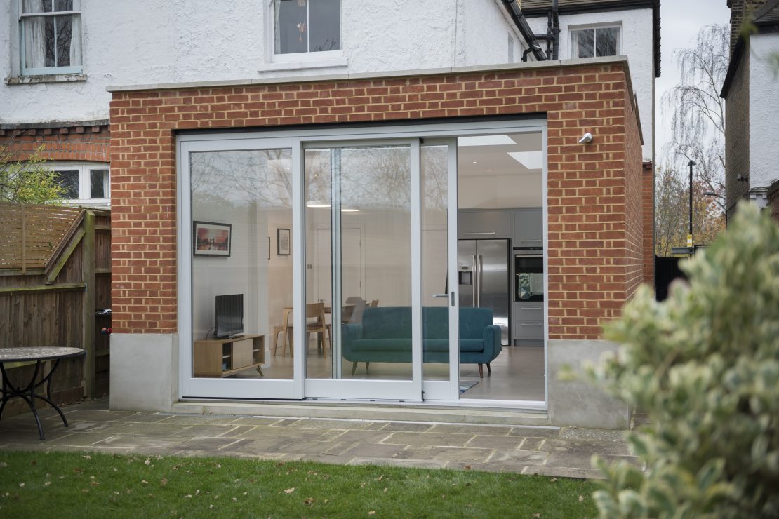 white sliding timber patio doors